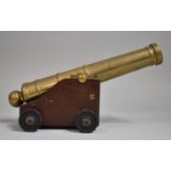 A Nice Quality Heavy Bronze Model of a Ships Cannon on Wooden Carriage, 27cm long