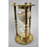 A Mid 20th Century Brass Hourglass, 24cm high