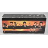 A Boxed Set of James Bond VHS Videos, One Replacement