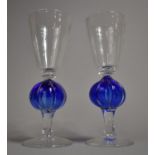 A Pair of Hand Blown Two Tone Glass Goblets with Segmented Knops, Signed to Base, 22cm high