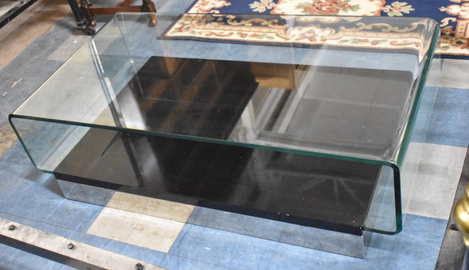 A Heavy Modern Smoked Glass Two Tier Coffee Table, 119x64cm