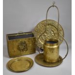 A Collection of Various Brass to Comprise Pressed Circular Chargers, Newspaper Store etc