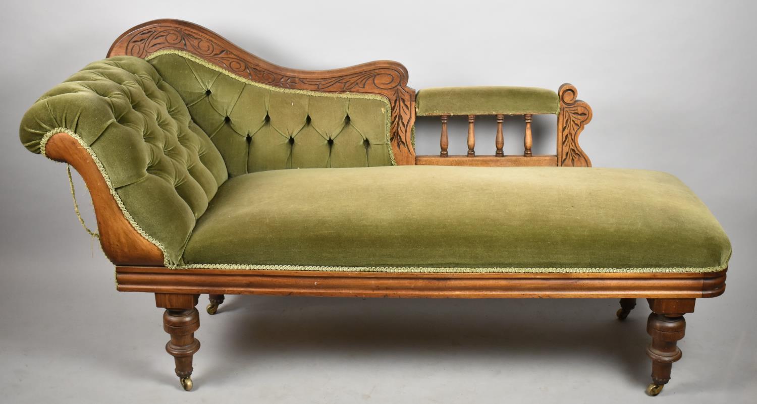 A Late Victorian/Edwardian Buttoned Upholstered Mahogany Framed Daybed