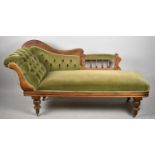 A Late Victorian/Edwardian Buttoned Upholstered Mahogany Framed Daybed