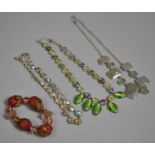 A Collection of Costume Jewellery to Include Jewelled Necklace, White Metal Sectional Necklace,