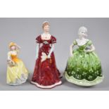 A Collection of Three Figural Ornaments to Include two Coalport Examples