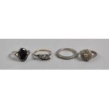 A Collection of Four Ladies Dress Rings to Include Three Silver and One 9ct Gold and Silver