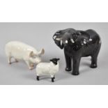 A Beswick Elephant, Pig and Black Faced Sheep