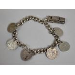A Silver Coin and Charm Bracelet, 36.9g with Padlock Clasp, Birmingham Hallmark