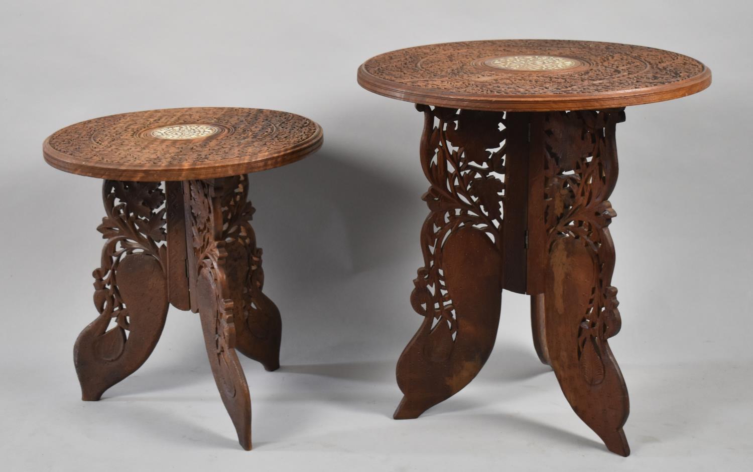 Two Ornately Carved Circular Indian Occasional Tables on Folding Tripod Supports, 45cm and 38cm