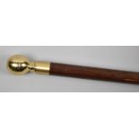 A Reproduction Three Section Walking Cane with Brass Handle Which Incorporates Inner Glass Flask and