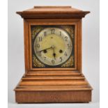 A Mid 20th Century Oak Cased Mantle Clock of Architectural Form with Continental Eight Day Movement,