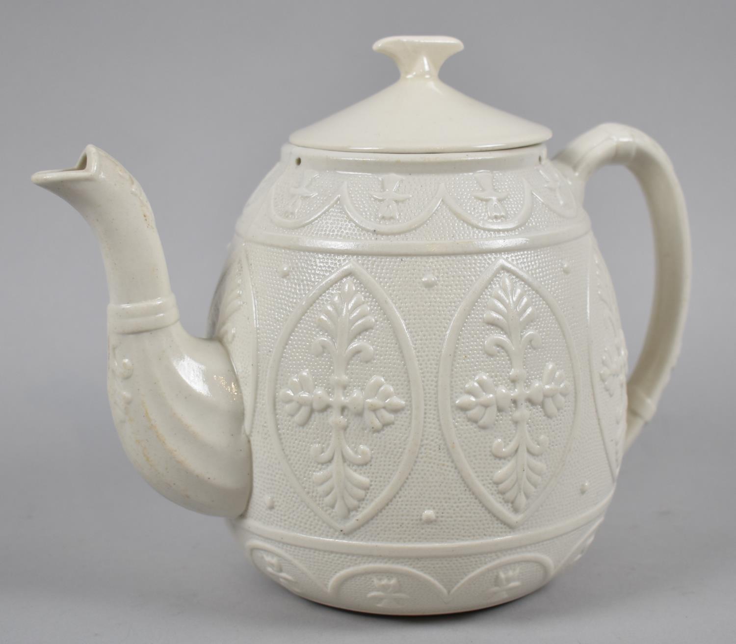 A Late Victorian/Edwardian Salt Glazed Teapot, Relief Decoration to Body, 17cm high