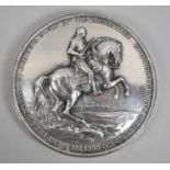 A Silver Mounted Circular Plaque Decorated in relief with Mounted King, Stamped 800, 15cm diameter