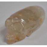 A Reproduction Carved Rock Crystal Skull of Elongated Form, 15cm Long