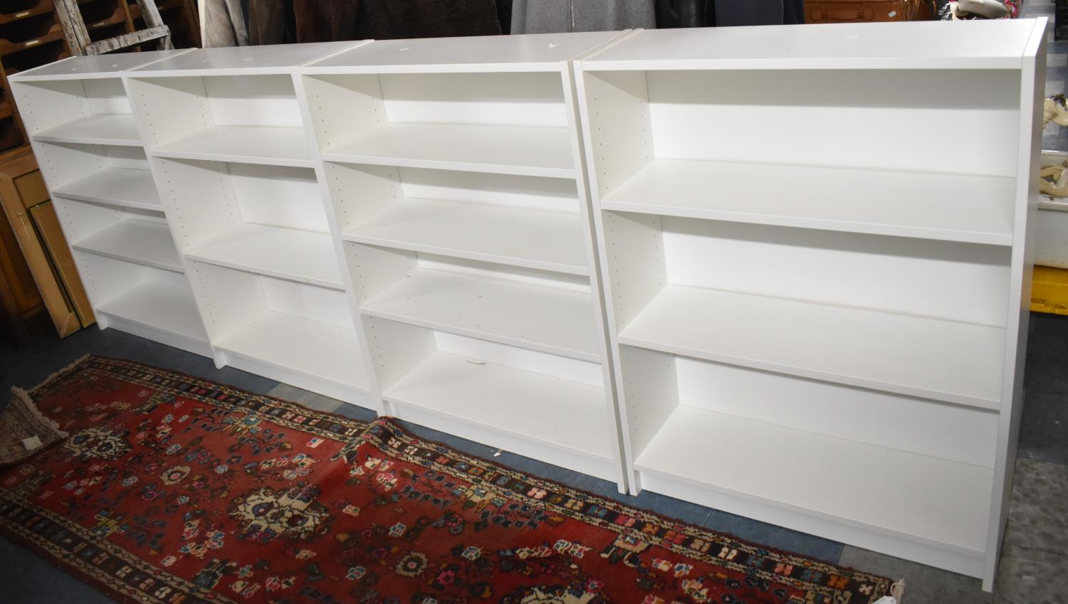 A Set of Four White Painted Shelving Units, Each 80cm wide