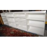 A Set of Four White Painted Shelving Units, Each 80cm wide