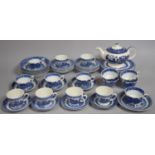 A Collection of Various Blue and White Willow Pattern Teawares to comprise Teapot, Cups, Saucers,