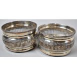 A Near Pair of Silver Plated Bottle Coasters with Pierced Sides, 12.5cm Diameter