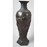 A Chinese Reproduction Bronze Vase Decorated in Relief with Dragons, 30cm high