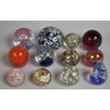 A Collection of Various Large and Medium Glass Paper Weights