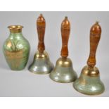 A Collection of Three Enamelled Brass Hand Bells with Dolphin Decoration Together with a Similar