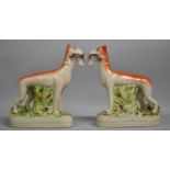 A Pair of Reproduction Staffordshire Standing Greyhounds with Hare in Mouth, 28cm high