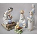 A Collection of Four Lladro Ornaments and a Continental Rabbit Ornament