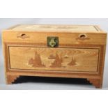 A Carved Oriental Camphor Wood Chest, 103cm wide