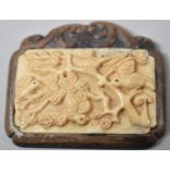 A Japanese Carved Wood and Bone Tablet Decorated in Relief with Birds in Branches, Inset Signed Disk