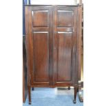 An Edwardian Mahogany Shelved Side Cabinet with Panelled Doors, 62cm wide