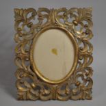 A Reproduction Pierced Gilt Easel Backed or Wall Hanging Picture Frame, 42x35cm