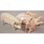 A Collection of Three Beswick Pig Ornaments