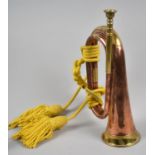 A Military Copper and Brass Bugle by L P Potters of Aldershot, 30cm high