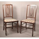 A Pair of Edwardian Sting Inlaid Walnut and Mahogany Salon Chairs