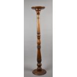 An Edwardian Mahogany Torchere Stand with Circular Top, the Support and Base with Acanthus