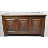 A Mid 20th Century Three Panel Oak Blanket Chest with Carved Front and Lifting Lid, 107cm wide