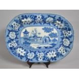 A Large Transfer Printed Meat Plate by Rogers & Son, "Elephant and Trainer" Pattern within Floral