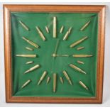 A Framed Novelty Wall Clock, the Hours Formed by Spent Shells, 43cm Square