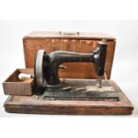 An Early Cased Manual Sewing Machine, Case and Machine in Need of Attention