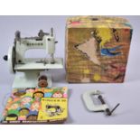 A Mid 20th Century Child's Toy Singer Sewing Machine