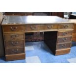 A Mid 20th Century Kneehole Writing Desk with Tooled Leather Top, In Need of Some Restoration and