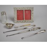 A Collection of Silver Handled and White Metal Items to Include Buttonhooks, Tea Strainer,