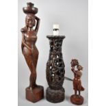 A Thai Carved Wooden Study of Maiden Carrying Vase on Head, a Thai Pierced Table Lamp Base and a