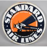 A Reproduction Pressed and Printed Metal Circular Sign for Standard Airlines, 59cm Diameter