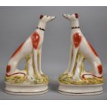 A Pair of Reproduction Staffordshire Seated Greyhounds, 24cm high