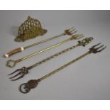 A Collection of Brass to Include Toasting Forks and Stationery Rack