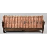 An Edwardian Wooden Book Trough Containing 25 Volumes Punch Library of Humour Published by The