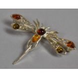 A Silver and Amber Dragonfly Brooch
