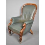 A Victorian Mahogany Framed Balloon Back Hide Upholstered Armchair